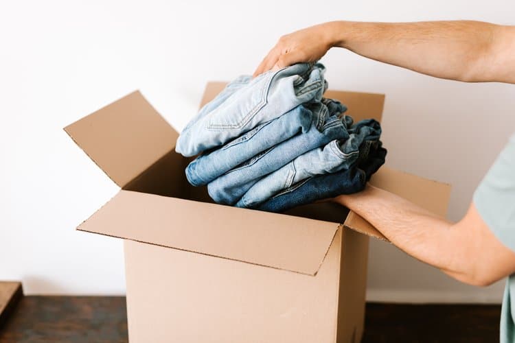 Professional organiser decluttering and packing before a home move